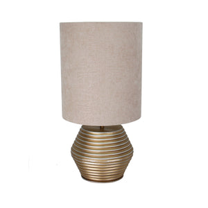Moderne Tischleuchte Tin in elegantem Gold und creme. Diese Leuchte setzt stilvolle Akzente in jedem Wohnraum.