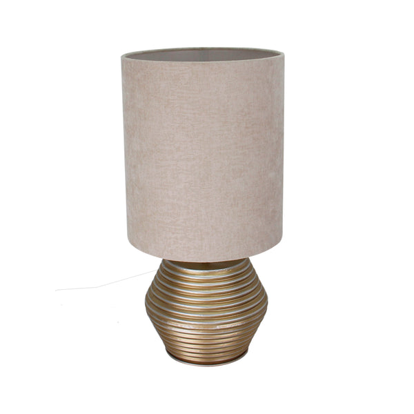 Detailaufnahme der modernen Tischleuchte Tin in Gold und Creme. Setzt glänzende Akzente und beleuchtet stilvoll jeden Tisch.