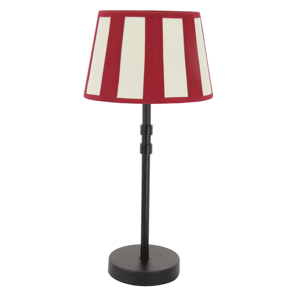 Der ovale Lampenschirm in Rot und Beige zaubert eine gemütliche Atmosphäre. Ideal für stimmungsvolle Lichtakzente.