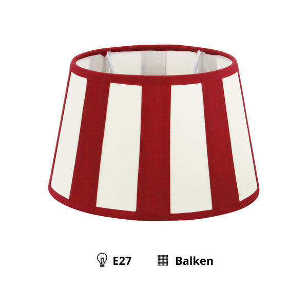Detailaufnahme des ovalen Lampenschirms in Rot und Beige. Er verleiht jedem Raum eine warme, einladende Atmosphäre.
