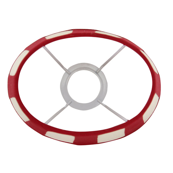 Detailansicht des ovalen Lampenschirms in Rot und Creme. Er verleiht jedem Raum eine moderne, einladende Atmosphäre.