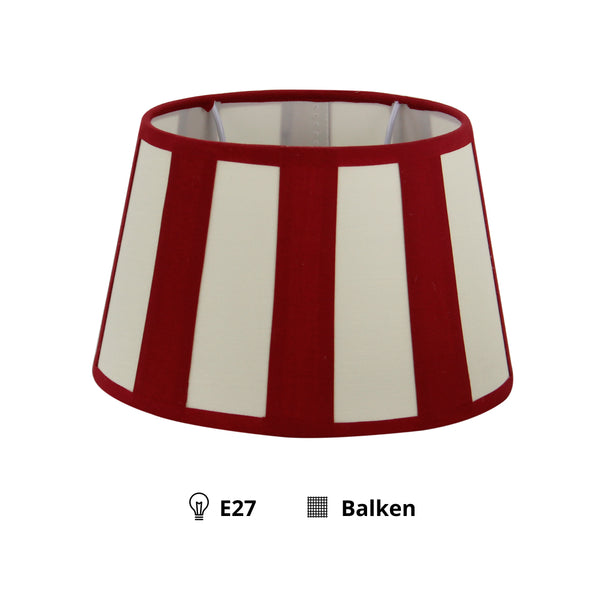 Detailaufnahme des ovalen Lampenschirms in Rot und Creme. Er verleiht modernen Räumen einen frischen Farbakzent.