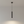 Detailansicht der grauen Pendelleuchte Tubo in Betonoptik. Ihr modernes Design bringt industriellen Charme in jeden Raum.