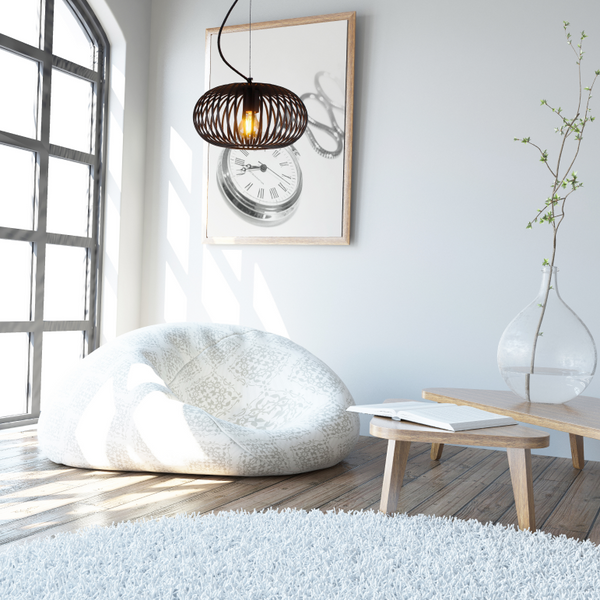 Die schwarze Pendelleuchte Curvato vereint industriellen Charme mit eleganter Form. Ideal für moderne Wohnräume.