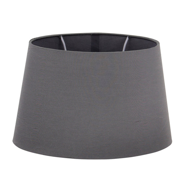 Der ovale Lampenschirm in Anthrazit bringt zeitlose Eleganz in jeden Raum. Ideal für stimmungsvolle Beleuchtung.