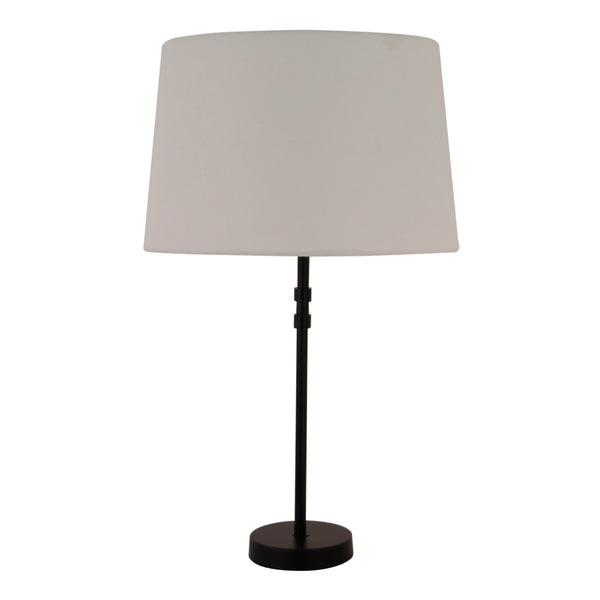 Der offwhite Lampenschirm Drum sorgt für eine sanfte, einladende Atmosphäre.