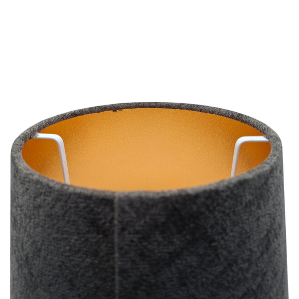 Der moderne Lampenschirm in Anthrazit und Gold verleiht jedem Raum einen Hauch von Eleganz und Wärme.