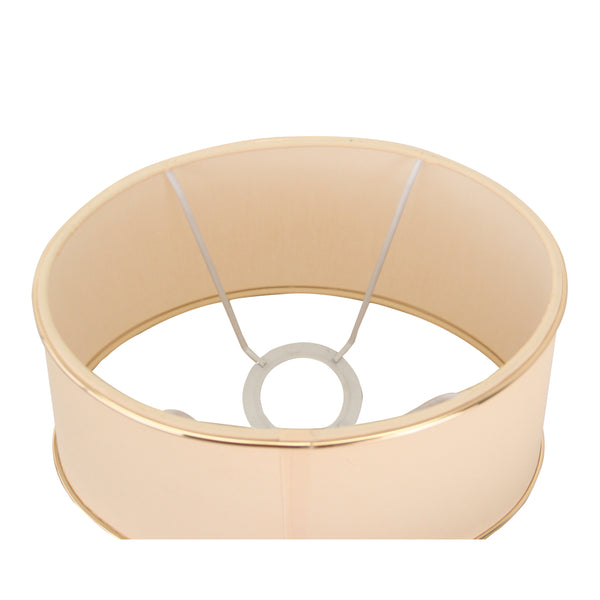 Detailaufnahme des ovalen Lampenschirms in Beige und Gold. Er verleiht jedem Raum eine warme, einladende Atmosphäre.