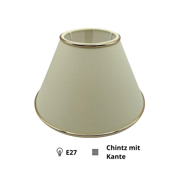 Detailansicht des Lampenschirms in Creme mit goldenen Akzenten. Perfekt für eine warme und einladende Raumgestaltung.
