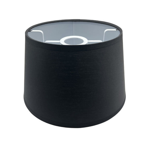 Schwarzer Lampenschirm Drum mit modernem Design. Ideal für stimmungsvolle Beleuchtung in verschiedenen Wohnbereichen.
