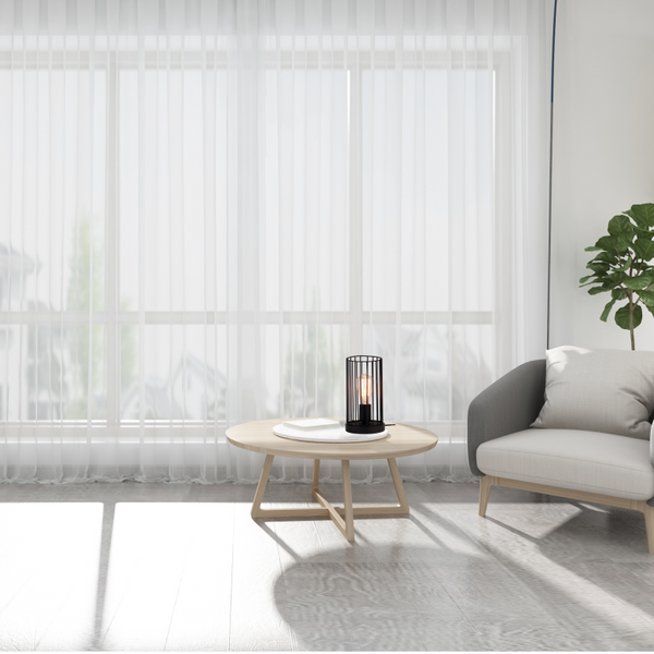 Detailansicht der schwarzen Tavola Tischleuchte. Ihr industrielles Design bringt modernen Charme in jeden Raum.
