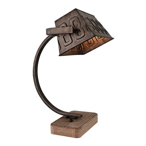 Die Tischleuchte im industriellen Design vereint rustikale Holz- und edle Metallakzente. Perfekt für ein modernes Ambiente.