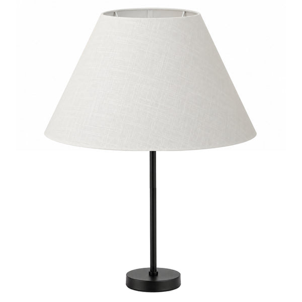 Der weiße Lampenschirm aus Leinen strahlt minimalistische Eleganz aus.